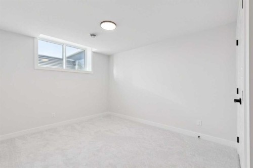 425 Lewiston Landing Ne, Calgary, AB - Indoor Photo Showing Other Room