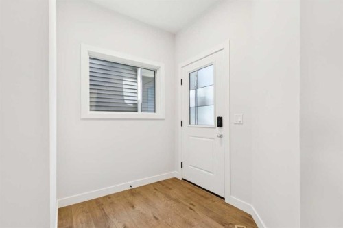 425 Lewiston Landing Ne, Calgary, AB - Indoor Photo Showing Other Room