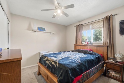 4420 57 Avenue, Innisfail, AB - Indoor Photo Showing Bedroom
