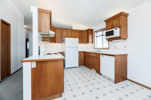 13 Duval Crescent, Red Deer, AB - Indoor Photo Showing Kitchen With Double Sink