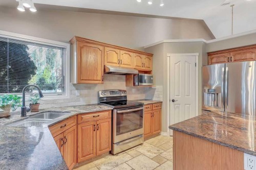 6406 55 Avenue, Ponoka, AB - Indoor Photo Showing Kitchen With Stainless Steel Kitchen With Double Sink