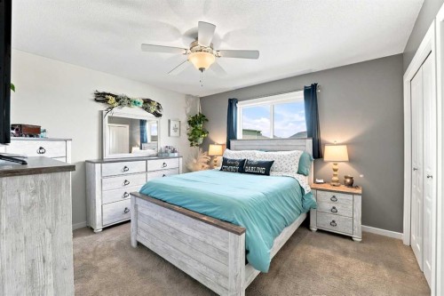 84 Mackenzie Crescent, Lacombe, AB - Indoor Photo Showing Bedroom