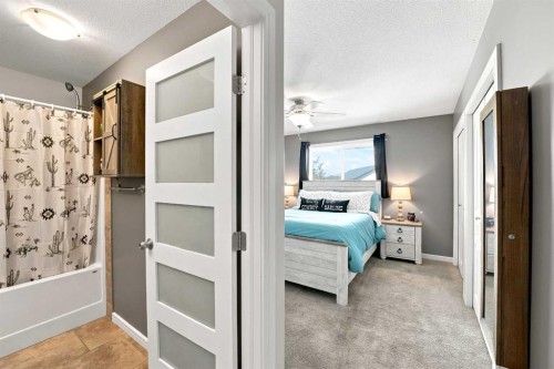 84 Mackenzie Crescent, Lacombe, AB - Indoor Photo Showing Bedroom