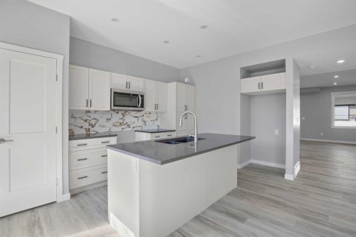 113 Aztec Crescent, Blackfalds, AB - Indoor Photo Showing Kitchen With Upgraded Kitchen