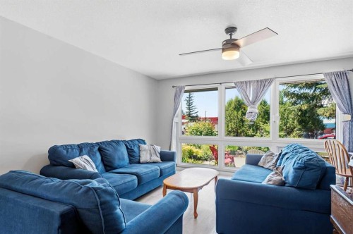 4132 50 Avenue, Innisfail, AB - Indoor Photo Showing Living Room