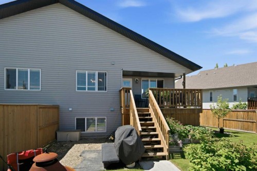 56 Heron Court, Penhold, AB - Outdoor With Deck Patio Veranda With Exterior