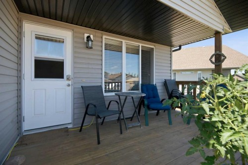 56 Heron Court, Penhold, AB - Outdoor With Deck Patio Veranda With Exterior