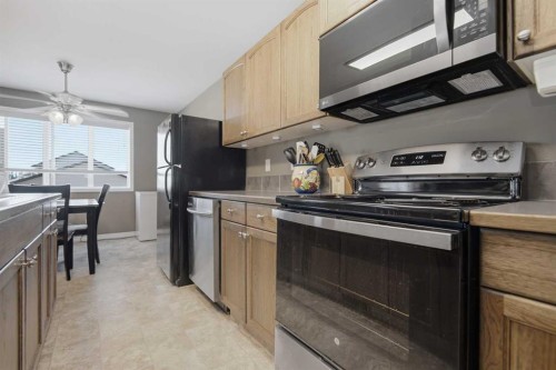 56 Heron Court, Penhold, AB - Indoor Photo Showing Kitchen