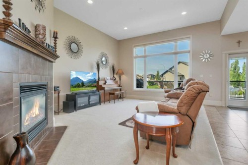 15 Liberty Place, Sylvan Lake, AB - Indoor Photo Showing Living Room With Fireplace