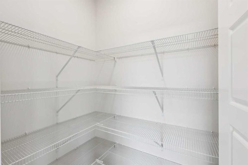 102 Bridgeport Landing, Chestermere, AB - Indoor With Storage