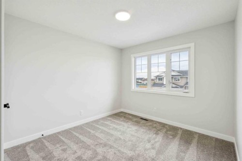 102 Bridgeport Landing, Chestermere, AB - Indoor Photo Showing Other Room