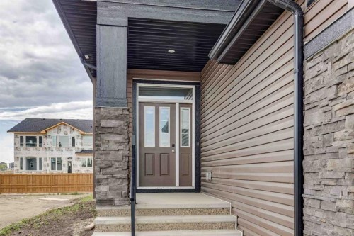 102 Bridgeport Landing, Chestermere, AB - Outdoor With Exterior