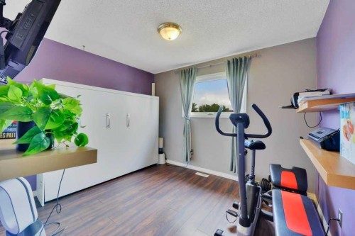 11 Greenham Drive, Red Deer, AB - Indoor Photo Showing Gym Room