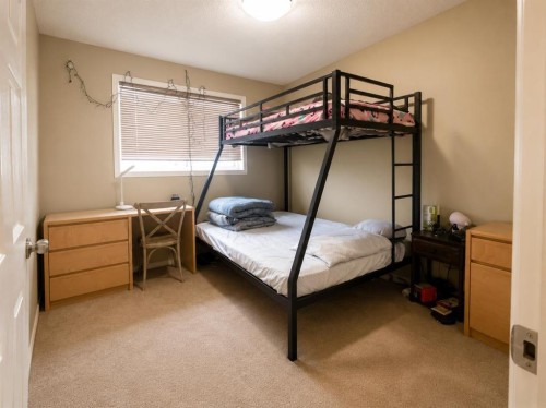 83 Lakeway Boulevard, Sylvan Lake, AB - Indoor Photo Showing Bedroom