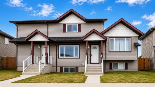 83 Lakeway Boulevard, Sylvan Lake, AB - Outdoor With Facade