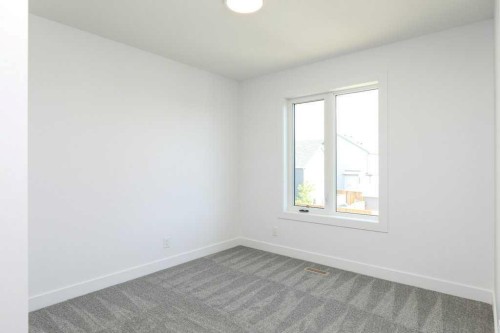 411 Caledonia Boulevard West, Lethbridge, AB - Indoor Photo Showing Other Room