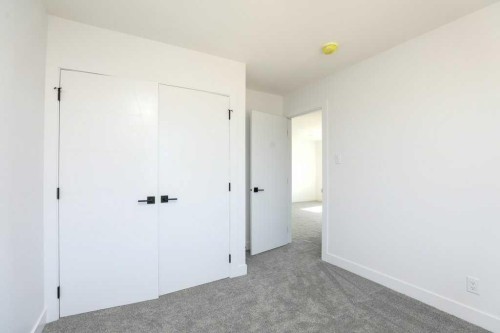 411 Caledonia Boulevard West, Lethbridge, AB - Indoor Photo Showing Other Room