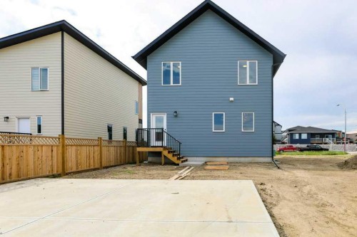 411 Caledonia Boulevard West, Lethbridge, AB - Outdoor With Exterior