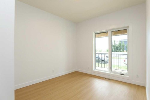 411 Caledonia Boulevard West, Lethbridge, AB - Indoor Photo Showing Other Room
