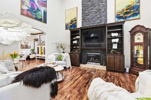 4552 Waskasoo Crescent, Red Deer, AB - Indoor Photo Showing Living Room With Fireplace