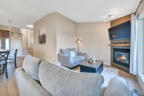 74 Turner Crescent, Red Deer, AB - Indoor Photo Showing Living Room With Fireplace