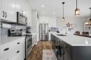 217 Augustus Way, Penhold, AB  - Indoor Photo Showing Kitchen With Stainless Steel Kitchen With Upgraded Kitchen 
