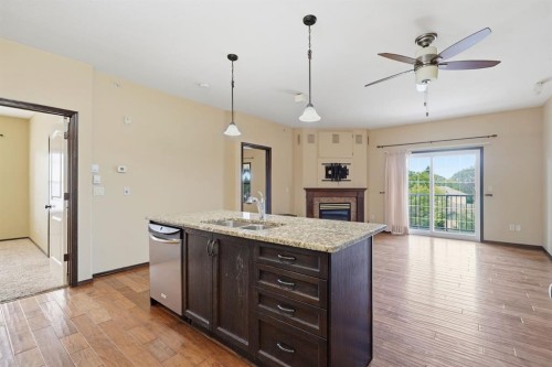 301-3505 51 Avenue, Red Deer, AB - Indoor Photo Showing Kitchen With Double Sink