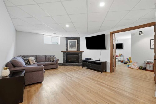 5 Westwood Crescent, Sylvan Lake, AB - Indoor With Fireplace