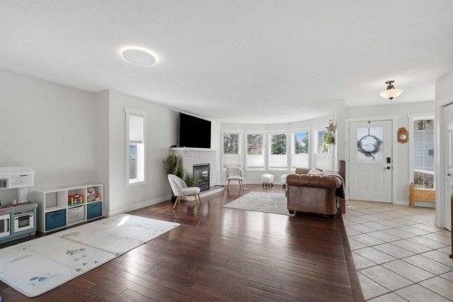 5 Westwood Crescent, Sylvan Lake, AB - Indoor Photo Showing Living Room With Fireplace