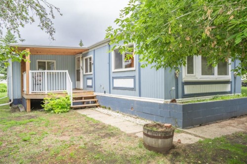 #8 48A Street Close, Alix, AB - Outdoor With Deck Patio Veranda