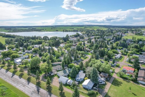 #8 48A Street Close, Alix, AB - Outdoor With Body Of Water With View