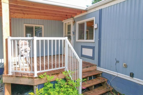 #8 48A Street Close, Alix, AB - Outdoor With Deck Patio Veranda With Exterior