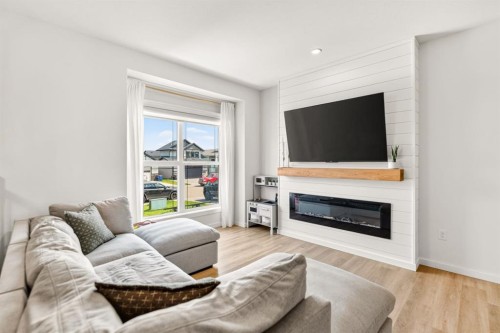 17 Alderwood Close, Blackfalds, AB - Indoor Photo Showing Living Room With Fireplace