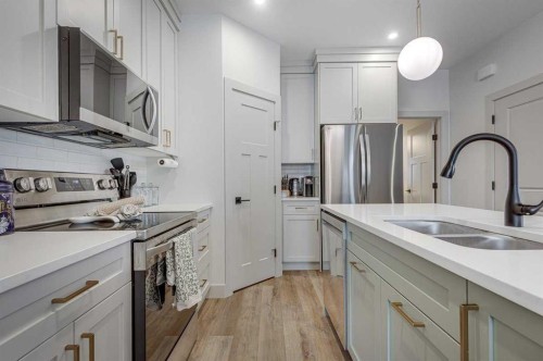 3-5324 49 Avenue, Lacombe, AB - Indoor Photo Showing Kitchen With Double Sink