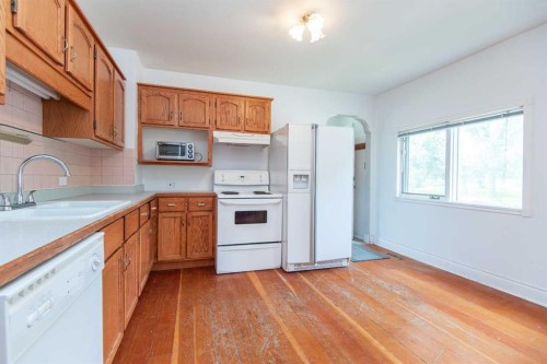 4645 47 Street, Red Deer, AB - Indoor Photo Showing Kitchen With Double Sink