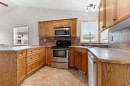 4 Horne Close, Sylvan Lake, AB  - Indoor Photo Showing Kitchen With Double Sink 