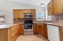 4 Horne Close, Sylvan Lake, AB  - Indoor Photo Showing Kitchen With Double Sink 