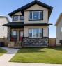 18 Hanson Green, Penhold, AB  - Outdoor With Deck Patio Veranda 