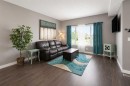 18 Hanson Green, Penhold, AB  - Indoor Photo Showing Living Room 