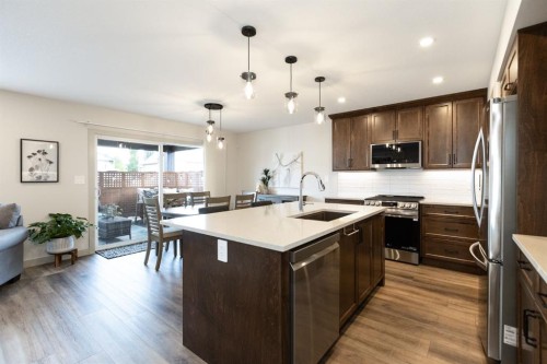 22 Napoleon Meadows Way, Innisfail, AB - Indoor Photo Showing Kitchen With Stainless Steel Kitchen With Upgraded Kitchen