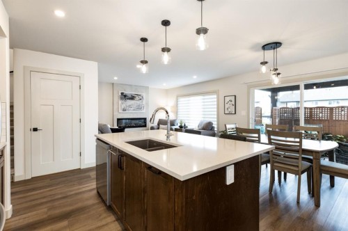 22 Napoleon Meadows Way, Innisfail, AB - Indoor Photo Showing Kitchen With Double Sink