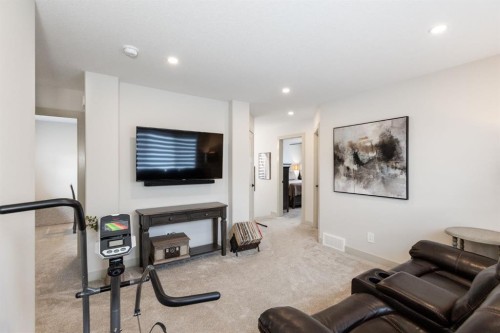22 Napoleon Meadows Way, Innisfail, AB - Indoor Photo Showing Living Room