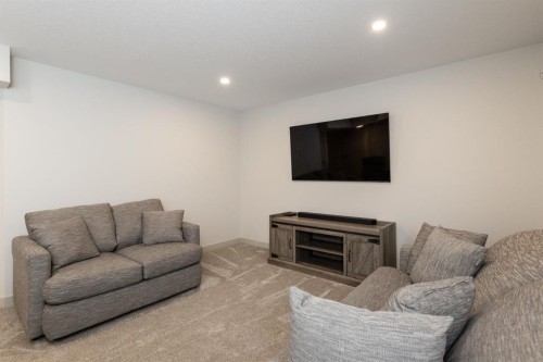 22 Napoleon Meadows Way, Innisfail, AB - Indoor Photo Showing Living Room