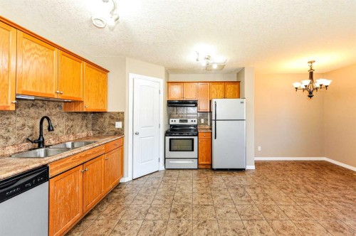 35-6802 50 Avenue, Camrose, AB - Indoor Photo Showing Kitchen With Double Sink