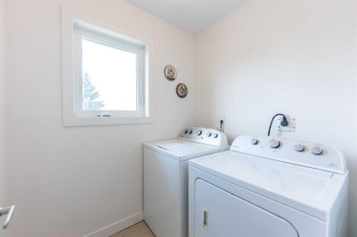 5140 51 Street, Lacombe, AB - Indoor Photo Showing Laundry Room