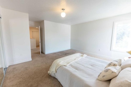 5140 51 Street, Lacombe, AB - Indoor Photo Showing Bedroom