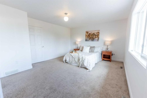 5140 51 Street, Lacombe, AB - Indoor Photo Showing Bedroom