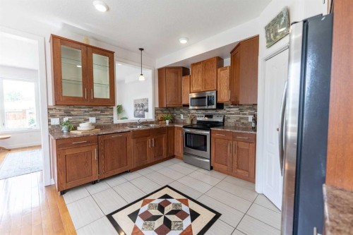 5140 51 Street, Lacombe, AB - Indoor Photo Showing Kitchen With Double Sink