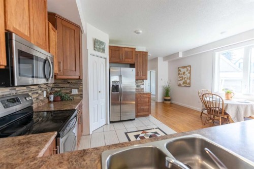 5140 51 Street, Lacombe, AB - Indoor Photo Showing Kitchen With Double Sink