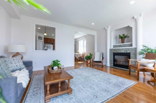 5140 51 Street, Lacombe, AB - Indoor Photo Showing Living Room With Fireplace